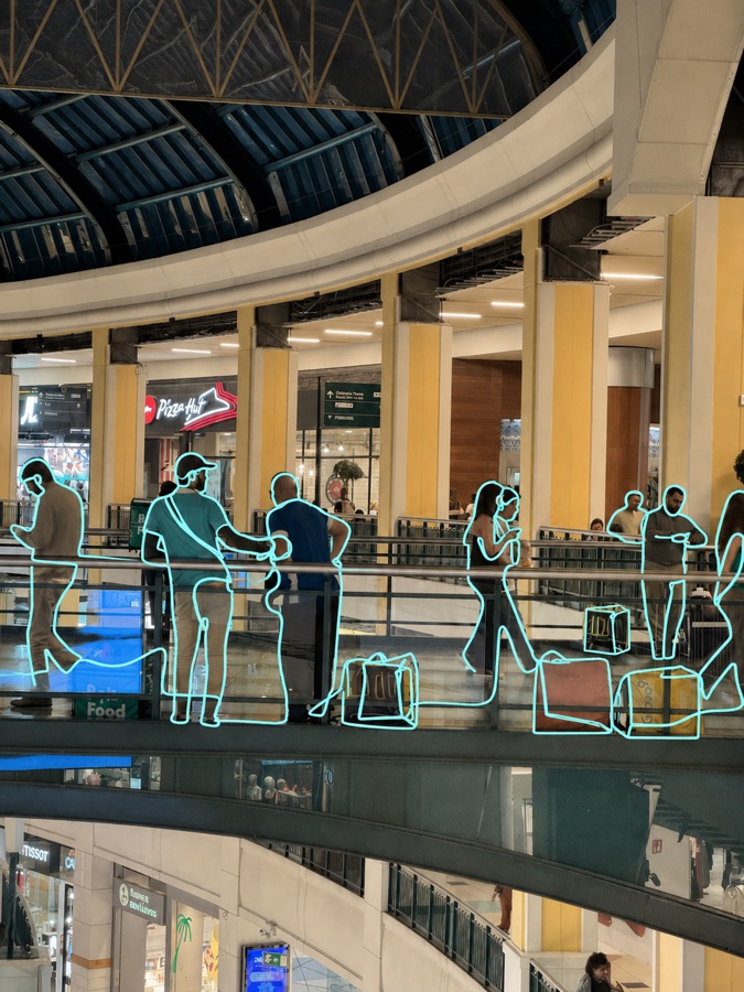 Courier workers in a shopping centre
